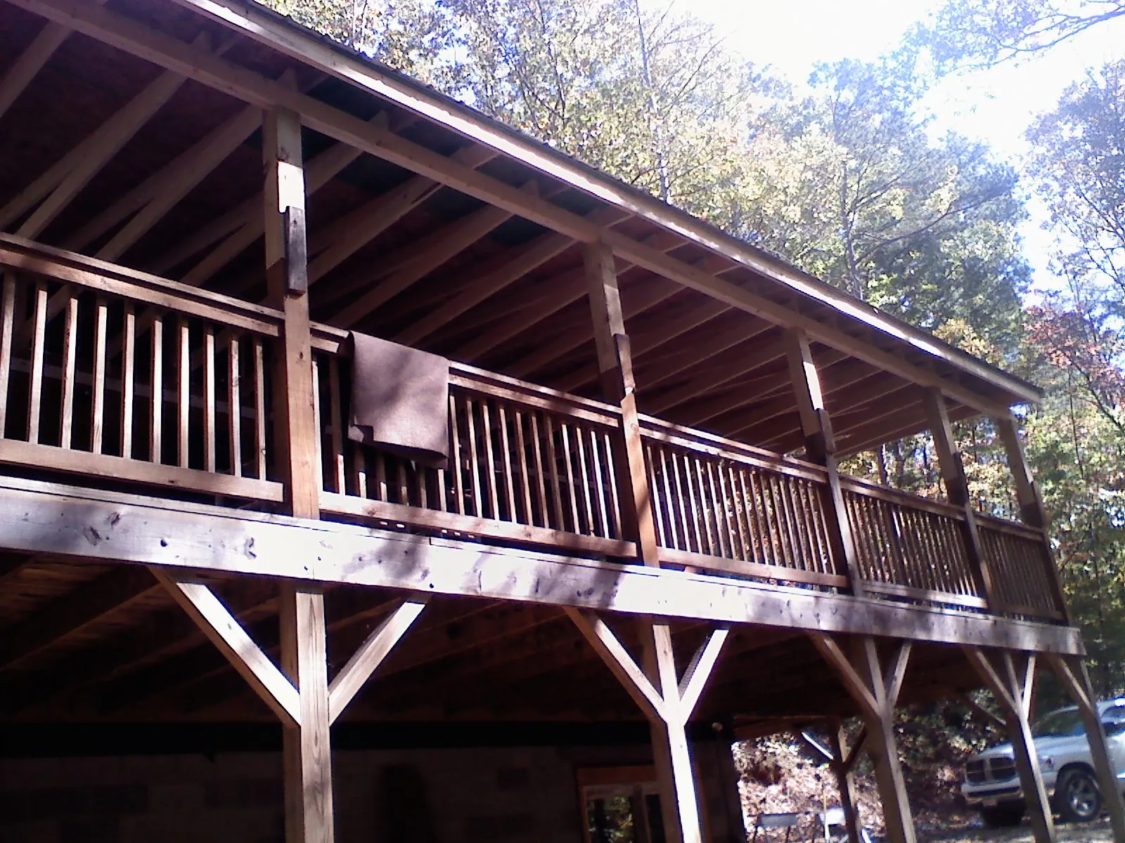 Timber framing under a new elevated porch and deck — Roof Leak Repair in Bakersville by Roofing Brothers